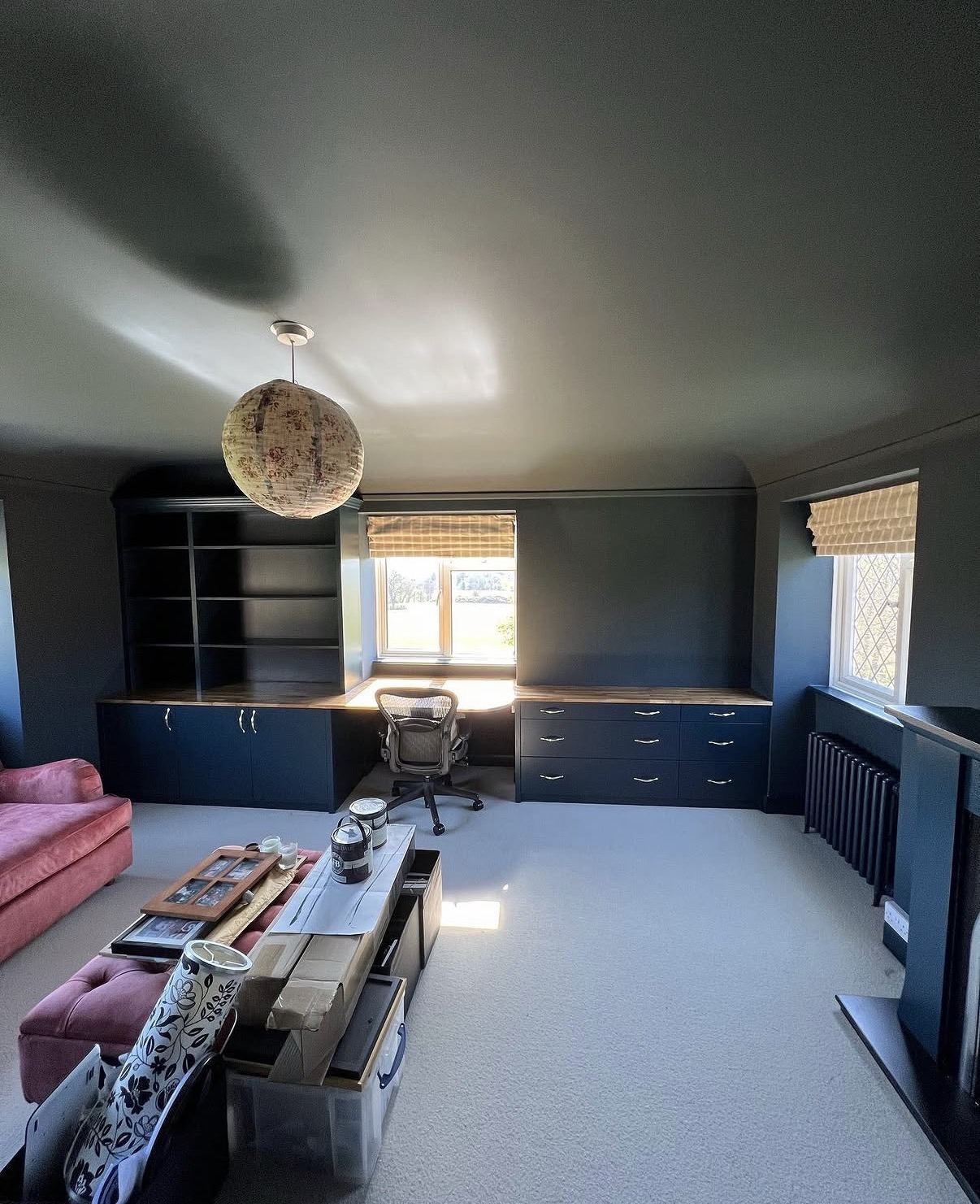 Dark navy home office with built-in shelving and desk — interior painting by Hamilton Decorating, East Sussex
