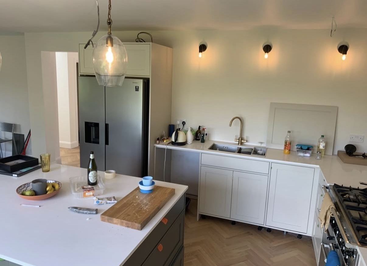Contemporary kitchen painted soft white by Hamilton Decorating, East Sussex